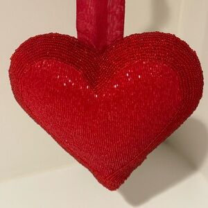 Beaded, puffed, heart.